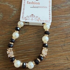 Elegant Black and Gold Bracelet All accessories in my closet are $8 or 3 for $20